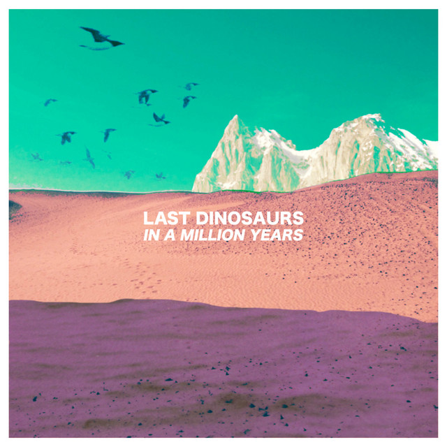 Album Cover: A desert landscape with a desaturated mountain background, with dinosaurs flying above